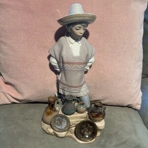 Retired Lladro Little mexican boy potter